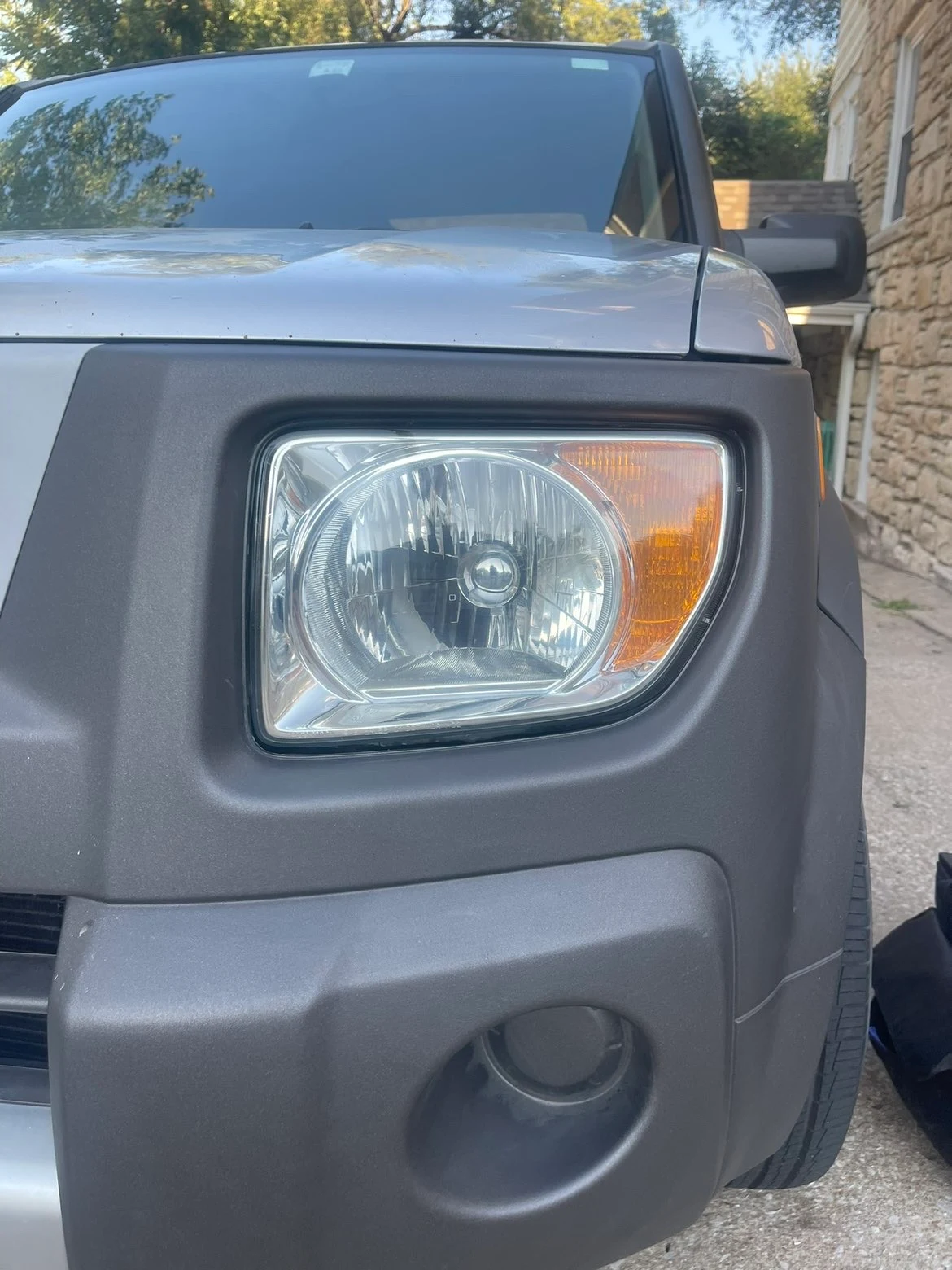 After: clear restored headlight — Bealm Restorations KC